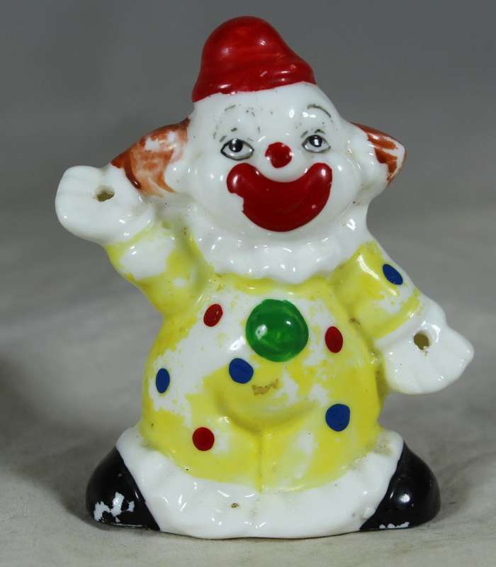 Happy clown in yellow and white