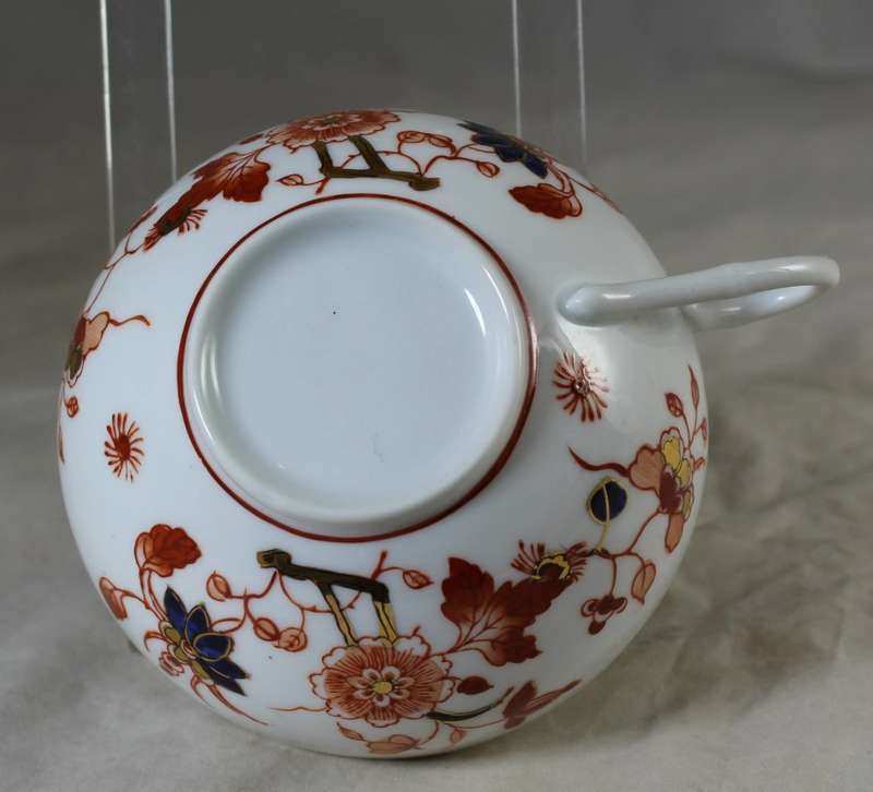 Very fine Emperors embossed face in cup