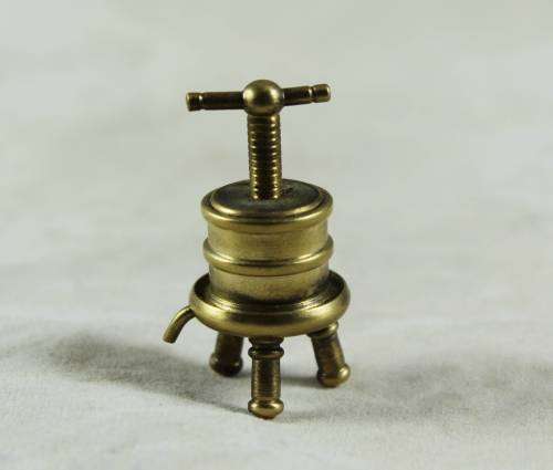 Miniature brass vintage clothes press