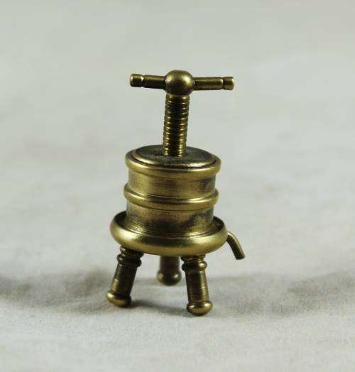 Miniature brass vintage clothes press