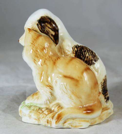 Loving cat and dog figurine