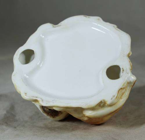 Loving cat and dog figurine