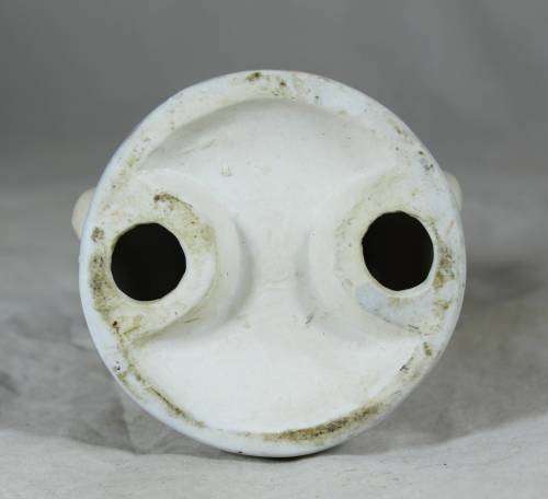 Porcelain clown dressed on cream