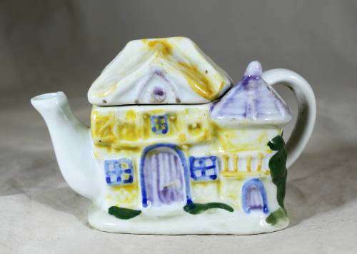 Small Character Tea pot