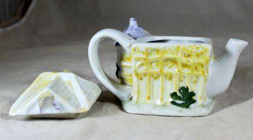 Small Character Tea pot