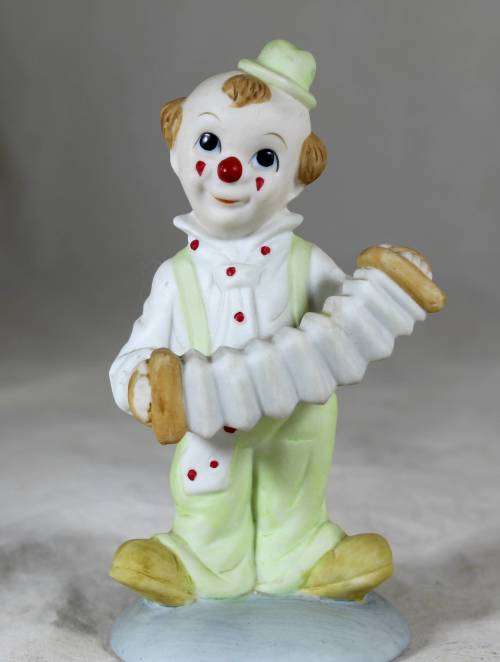 Clown playing the concertina