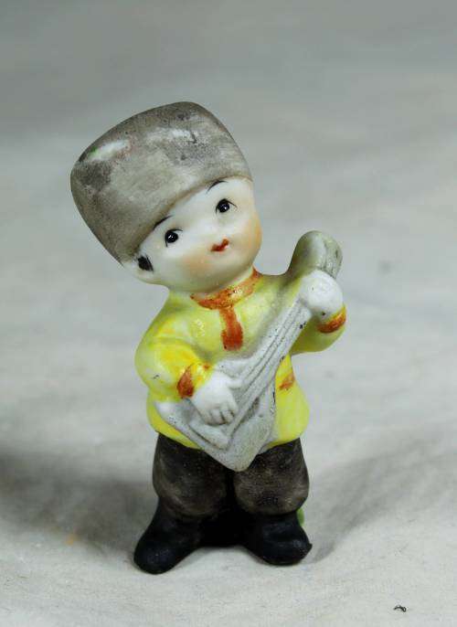 Miniature Slavic boy