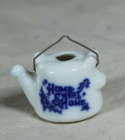 Miniature home sweet home kettle