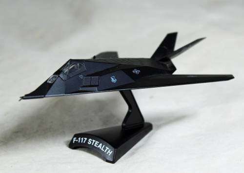 Postage Stamp Planes - Metal Die Cast on Stand -  F-117  Stealth  - Bid Now!!