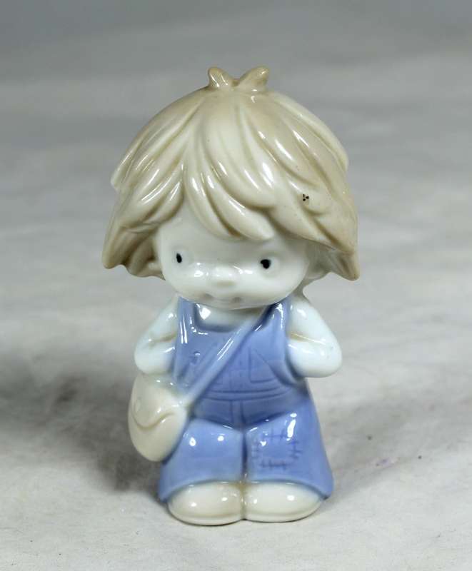 Small porcelain boy
