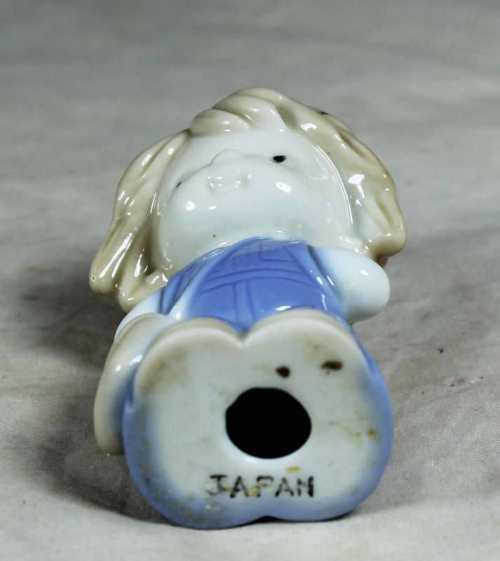 Small porcelain boy