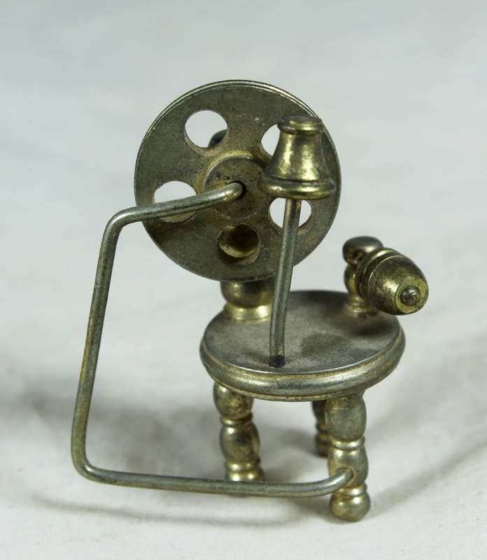 Miniature brass spinning wheel