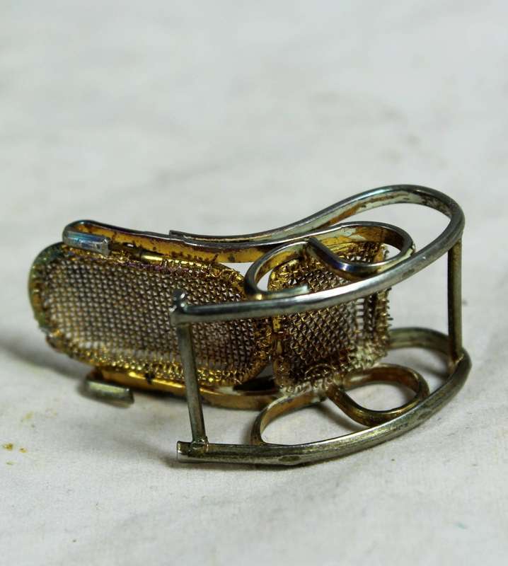 Miniature brass rocking chair
