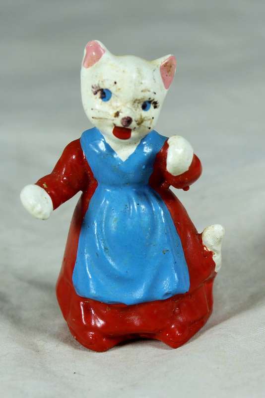 Miniature cat with apron