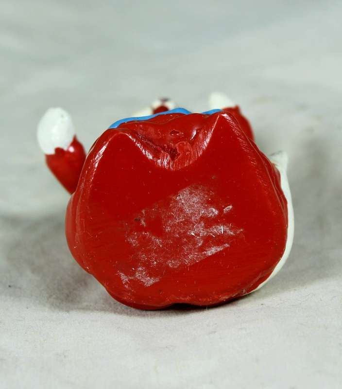 Miniature cat with apron