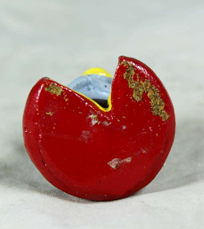 Miniature mouse on cheese