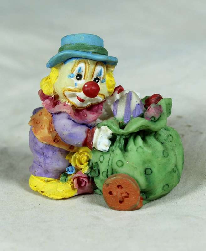 Miniature clown with presents