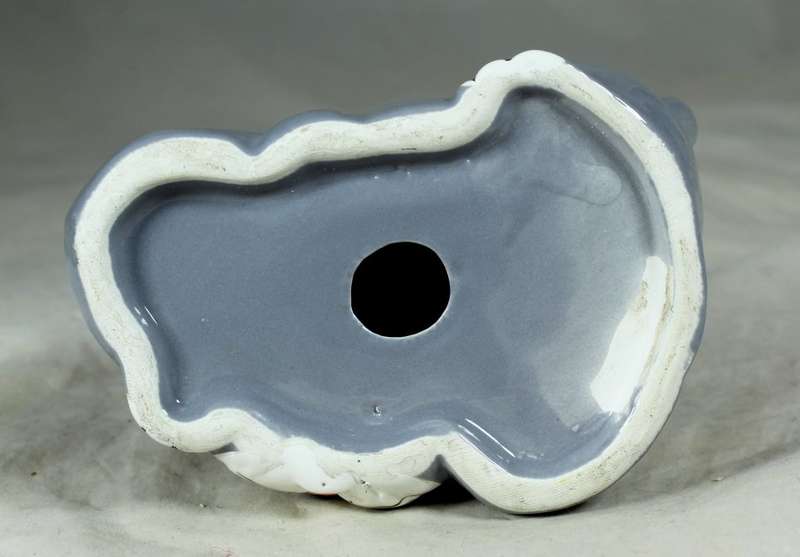 Small porcelain dog