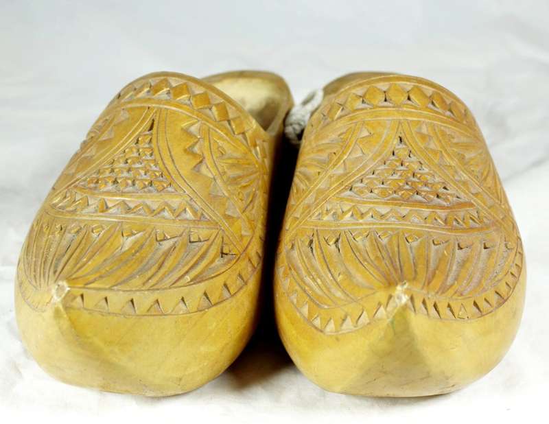 Pair of full size wooden Dutch shoes with carving