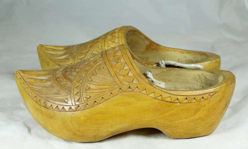 Pair of full size wooden Dutch shoes with carving