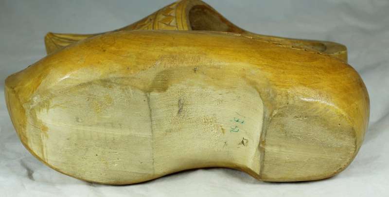 Pair of full size wooden Dutch shoes with carving