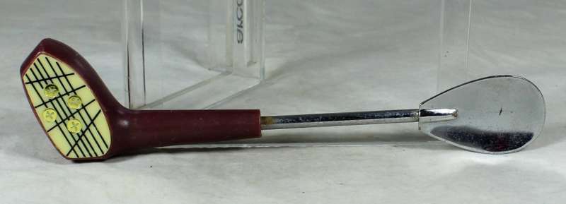 Golf putter with silver ice spoon