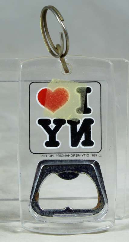 Bottle opener with key ring