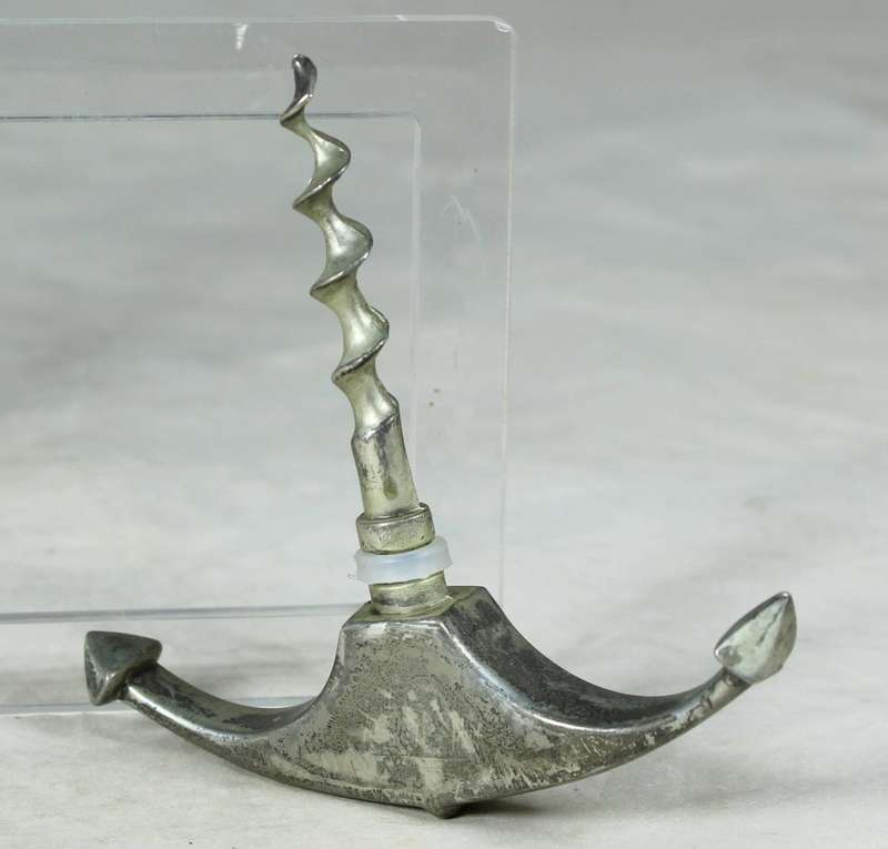 Metal anchor cork screw