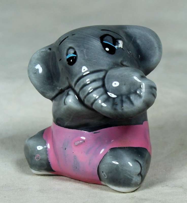 Miniature porcelain baby elephant