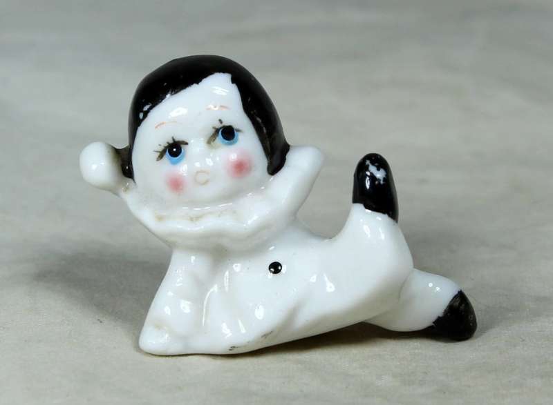 MINIATURE ORNAMENT - A PORCELAIN BABY PIERROT - BID NOW!!!
