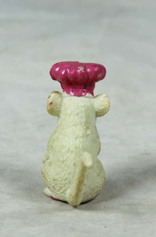 Miniature plastic mouse with a bakers hat