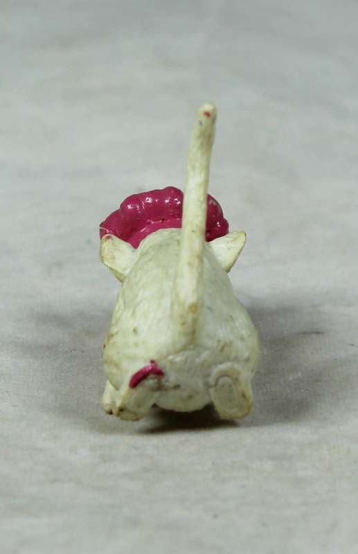 Miniature plastic mouse with a bakers hat