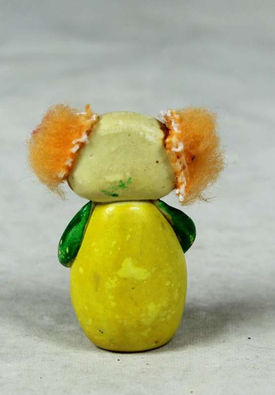 Miniature clown with orange hair