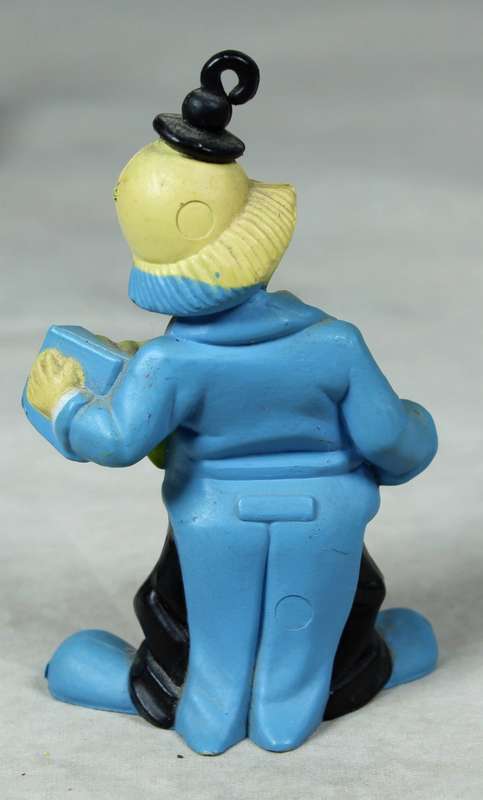 Miniature clown with a concertina and top hat