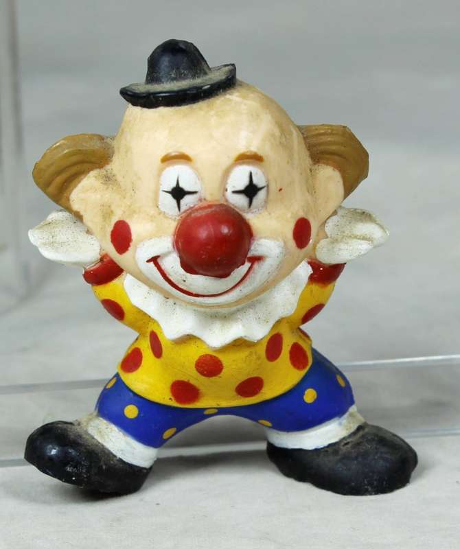 Miniature clown with a happy face