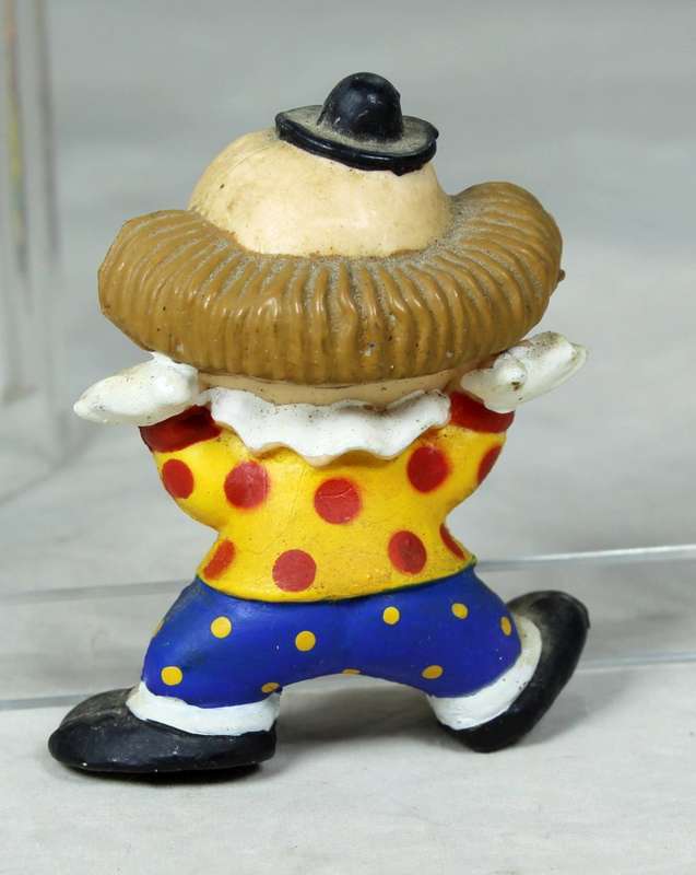 Miniature clown with a happy face