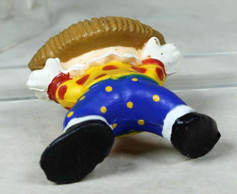 Miniature clown with a happy face