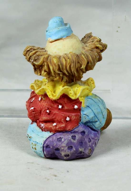 MINIATURE -  A COLOURFULL SEATED CLOWN - BID NOW!!!