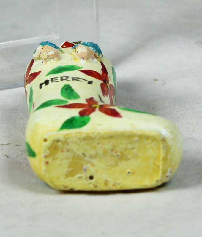 Miniature merry Christmas clown in a shoe