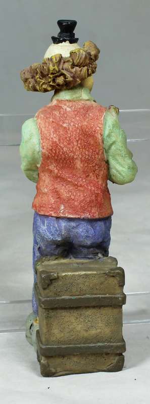 Small clown with a saxophone