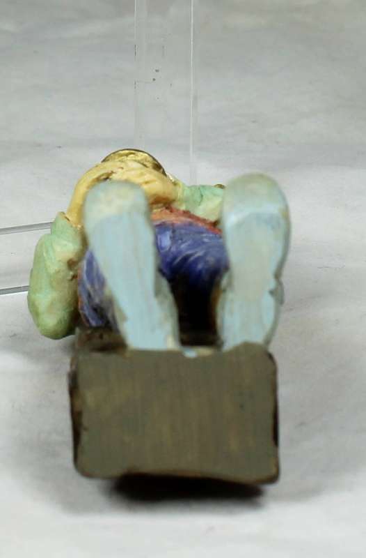 Small clown with a saxophone