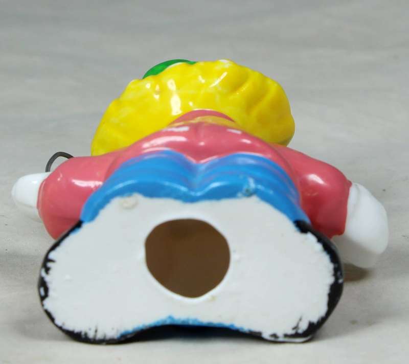 Small clown with fluffy balloons