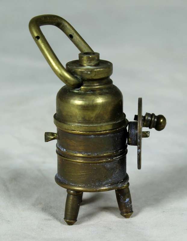 Miniature bronze manual washing machine