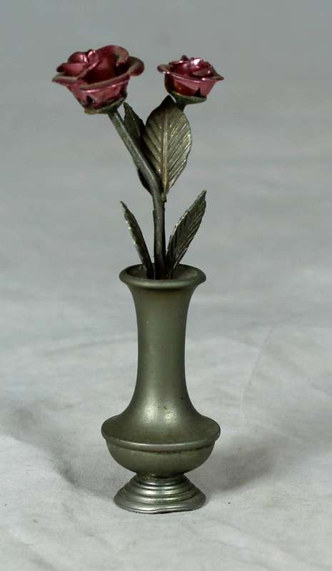 Miniature bronze pair of roses in a vase