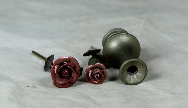 Miniature bronze pair of roses in a vase