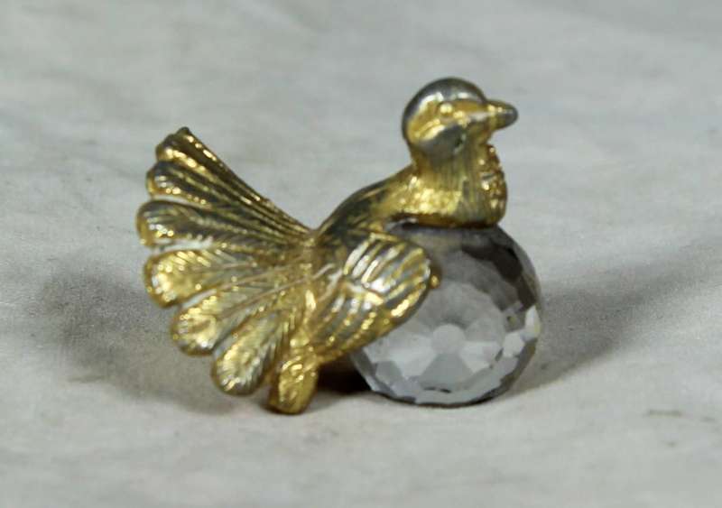 Miniature metal and glass dove