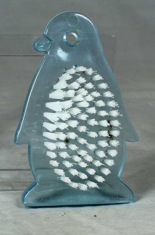 Penguin nail brush