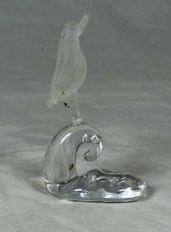 Frosted penguin on a pedestal
