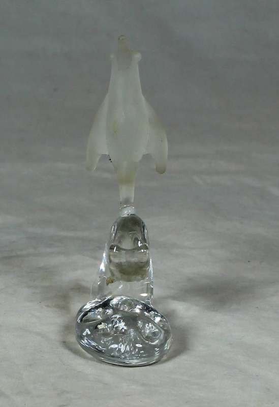 Frosted penguin on a pedestal