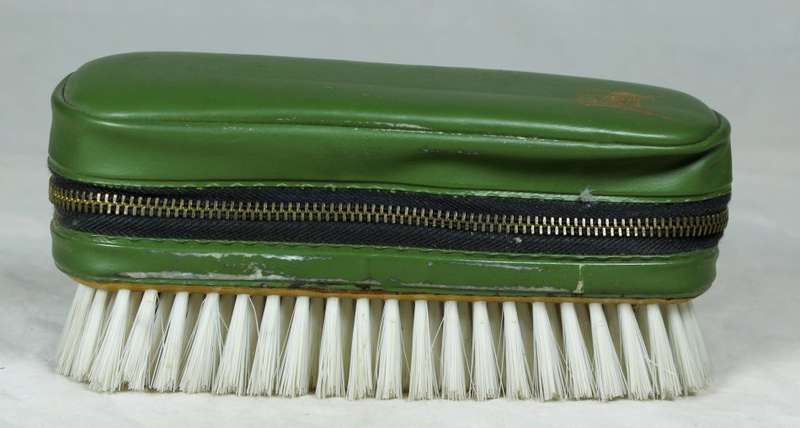 Brush with sewing kit